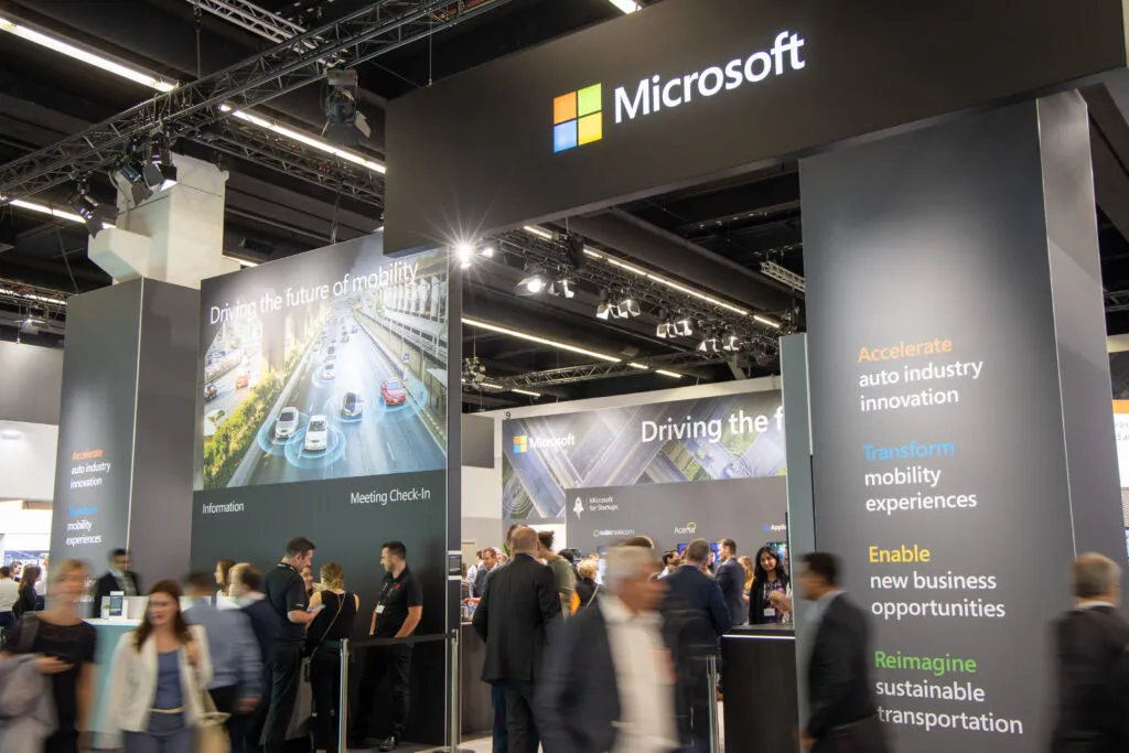 a group of people standing in front of a crowd