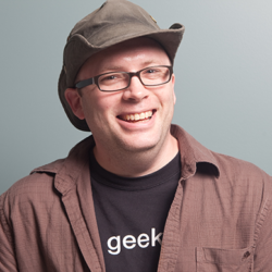 A photo of Rick Claus wearing a hat