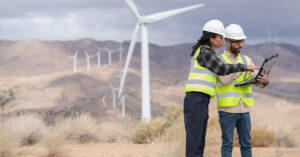 a person standing on top of a dirt field