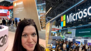 a woman standing in front of a store