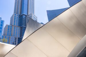 Architectural curves and angles with nature​ Keywords: human-built abstracts, detail, sustainable, sustainability; architecture; California; high-rise; texture; city; innovation; building; blue sky; clean air; cityscape