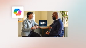 Finance and sales professionals collaborating at their desk.