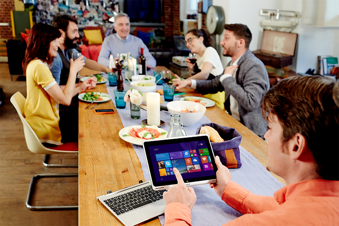 a group of people sitting at a table