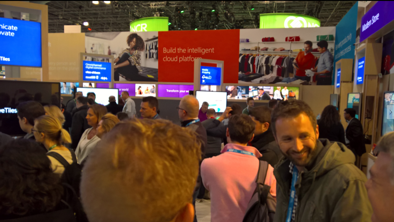 a group of people standing in front of a crowd