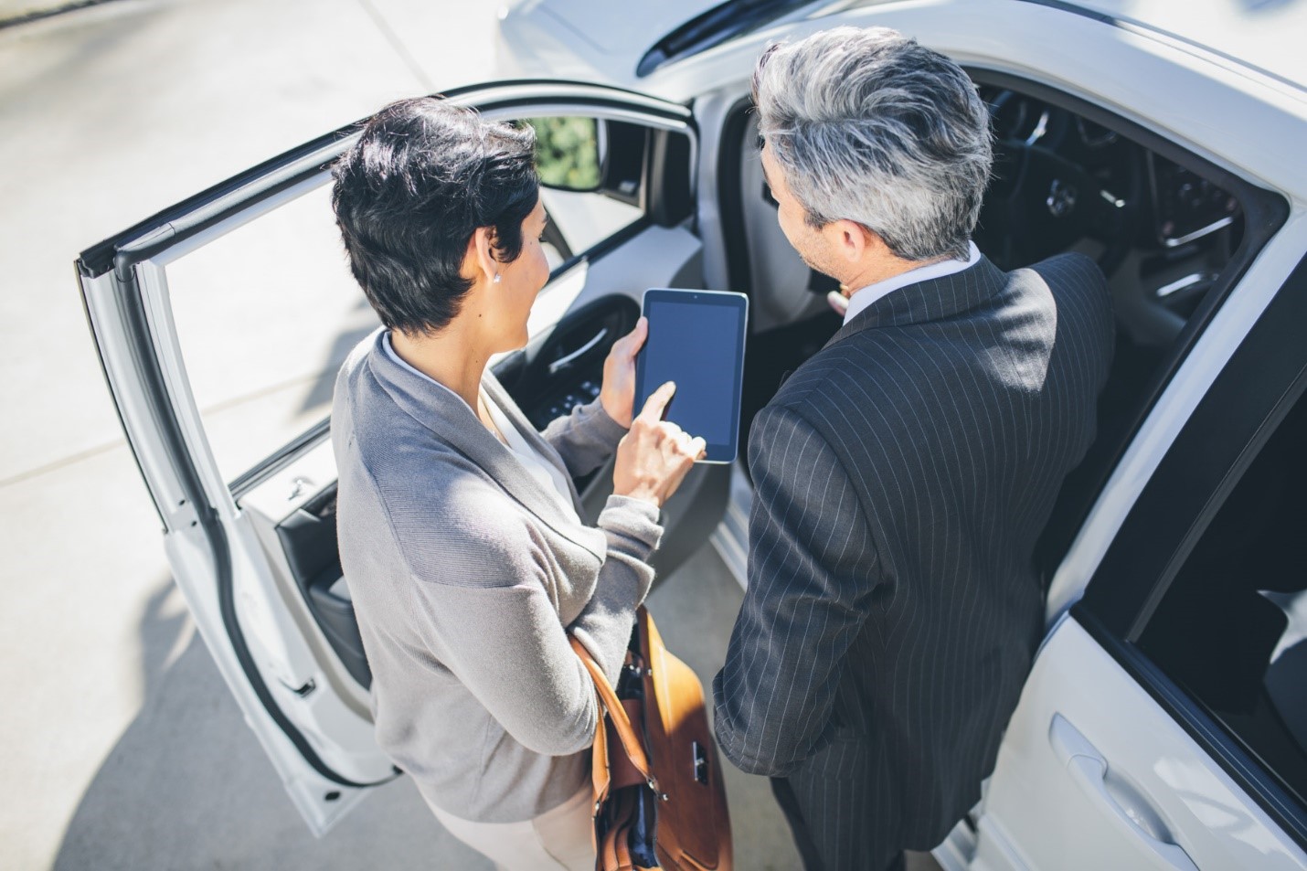 a group of people around each other