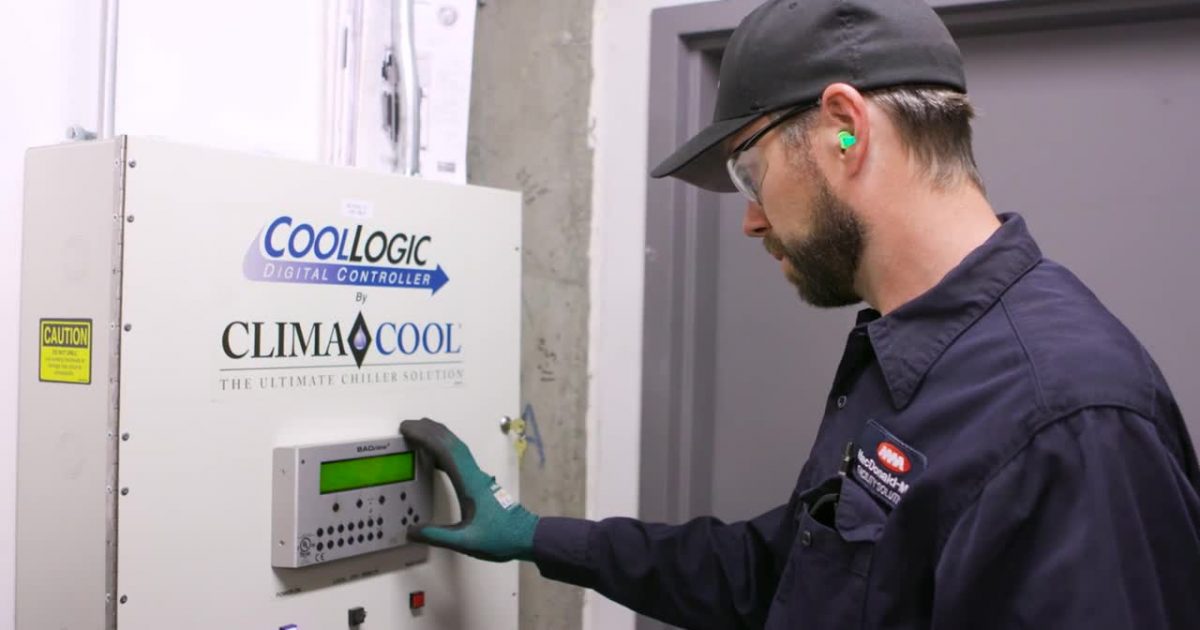 a man holding a sign