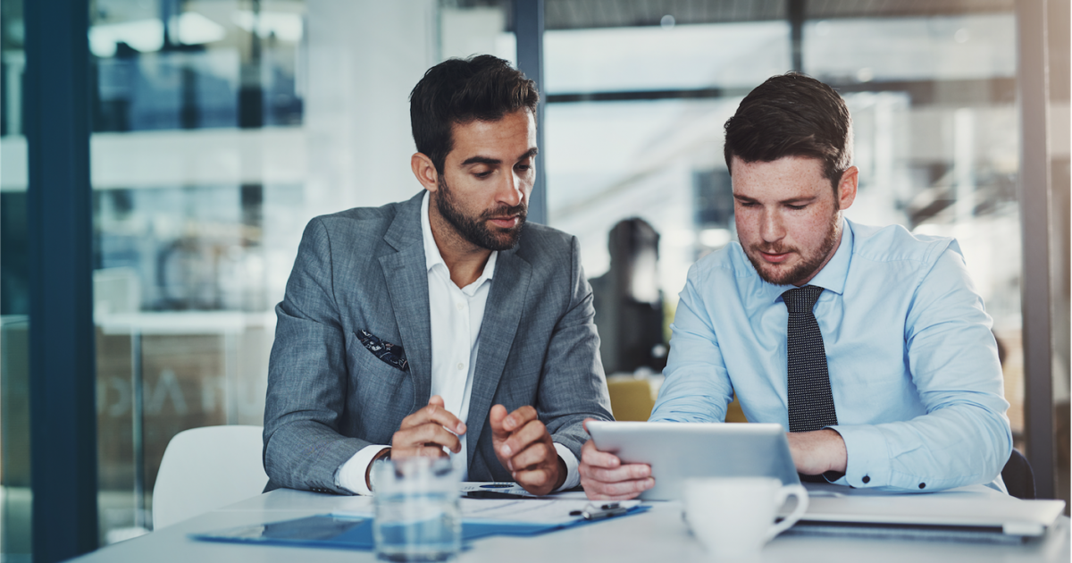 a group of people sitting at a table