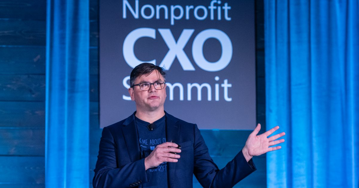 a man holding a sign