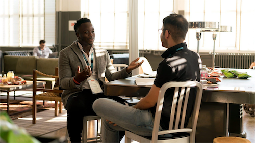 a group of people sitting at a table