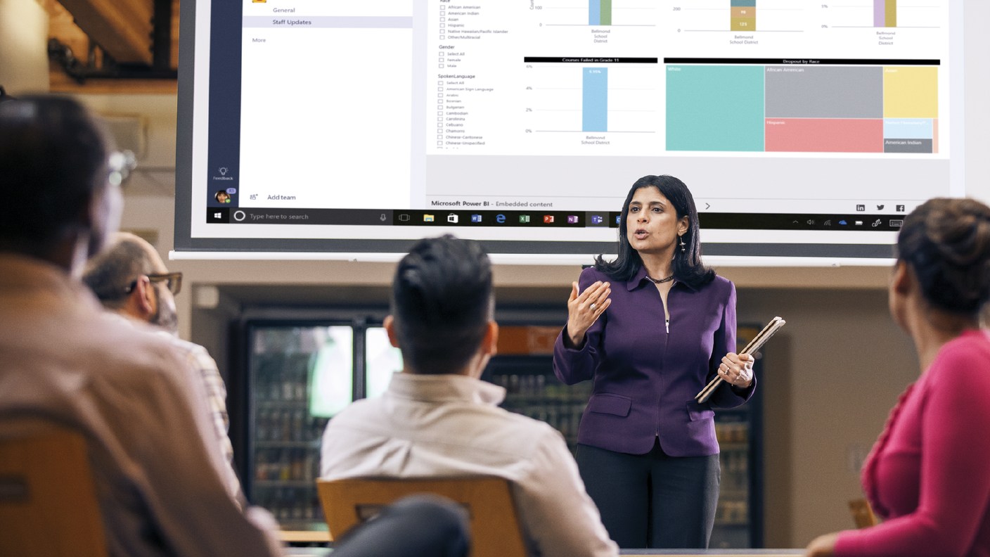 a group of people standing in a room