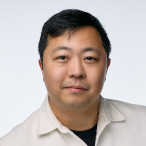 A man in a white jacket