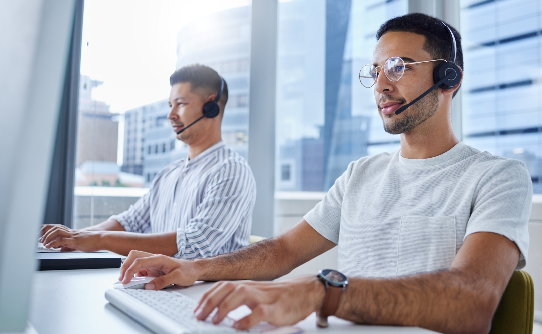 two men in a call center