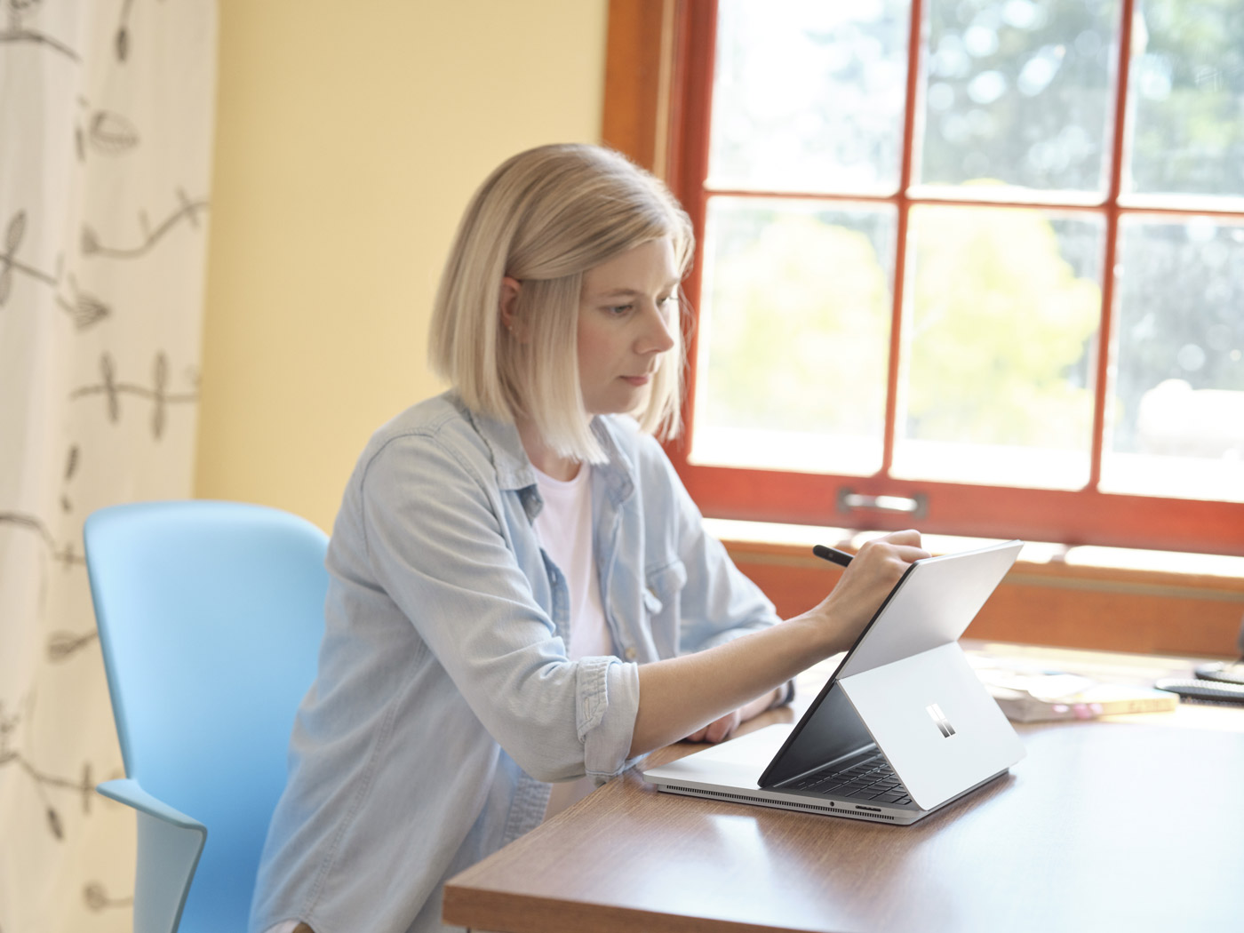 Teacher using a tablet device.