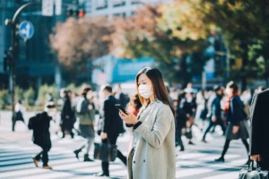 a group of people walking down the street