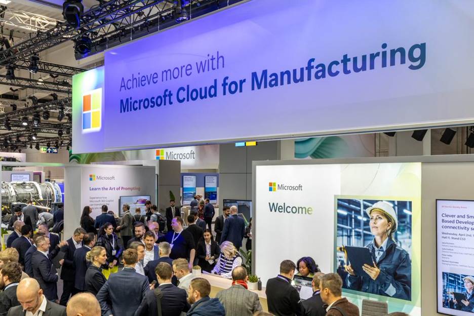 Large crowd gathers around the Microsoft Welcome Desk at Hannover Messe 2025