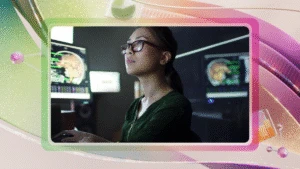 A data scientist analyzes brain scan images on dual computer monitors in a dimly lit lab.