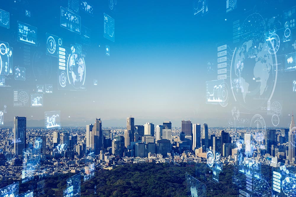 都市をデータが飛び交うイメージ