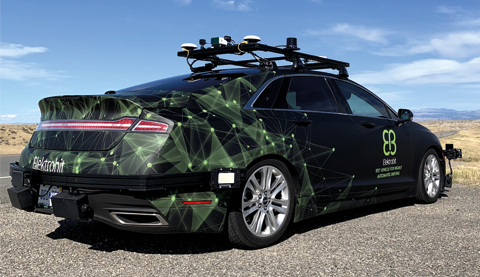 A green and black car