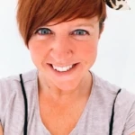 Kelly McGurk, a woman who is smiling and looking at the camera