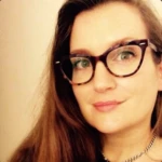 Tara Keatley, a woman wearing glasses