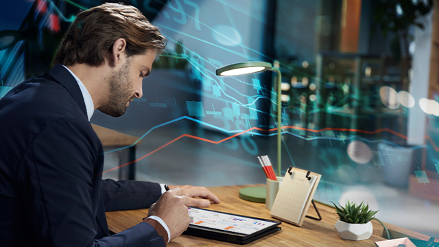 man working on his tablet