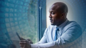 Man looking down at his phone