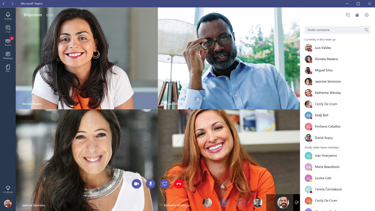 A group of four co-workers meeting over Microsoft Teams.