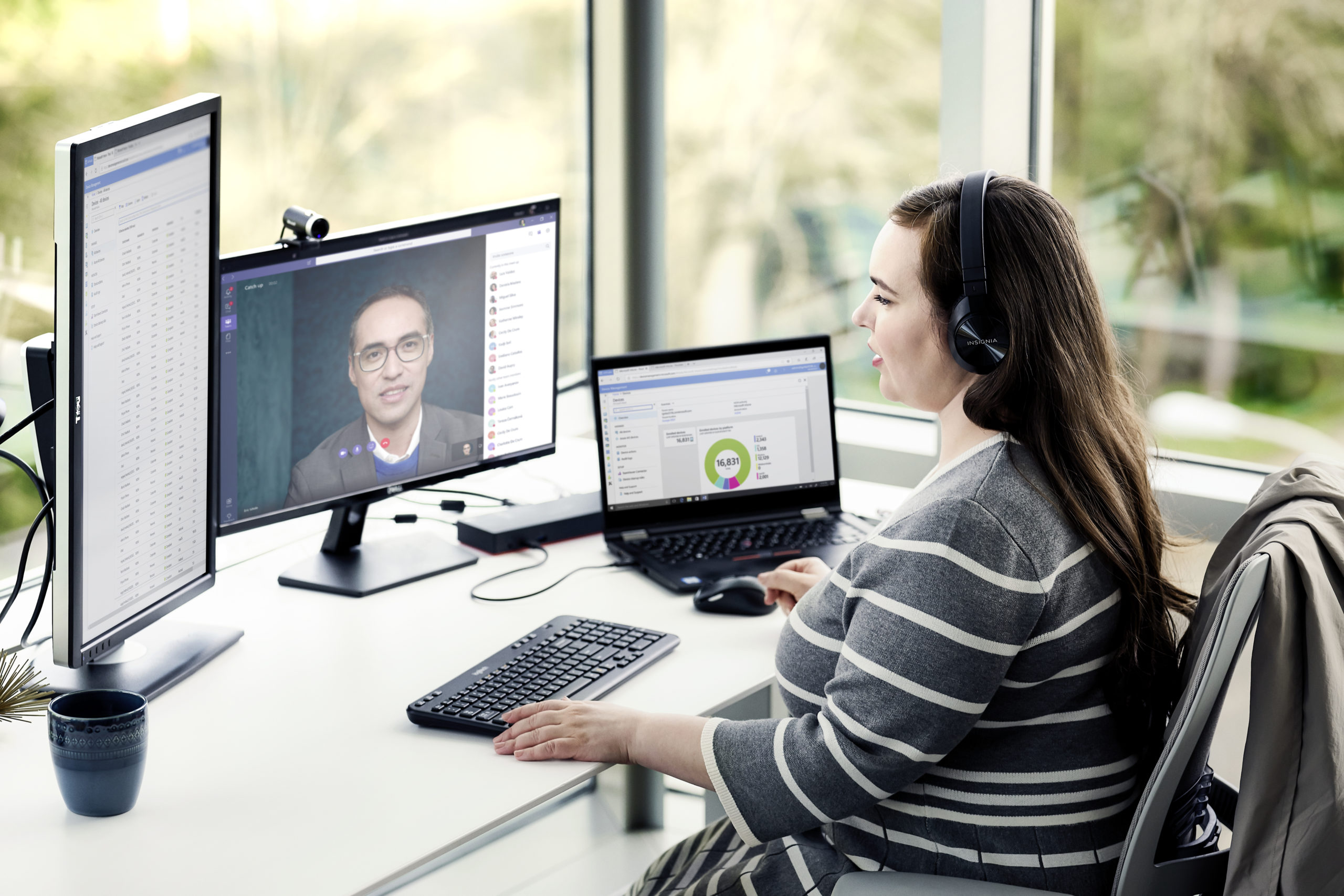 Enterprise employee working remotely from home on a Lenovo device, running Microsoft Teams, Word and Excel
