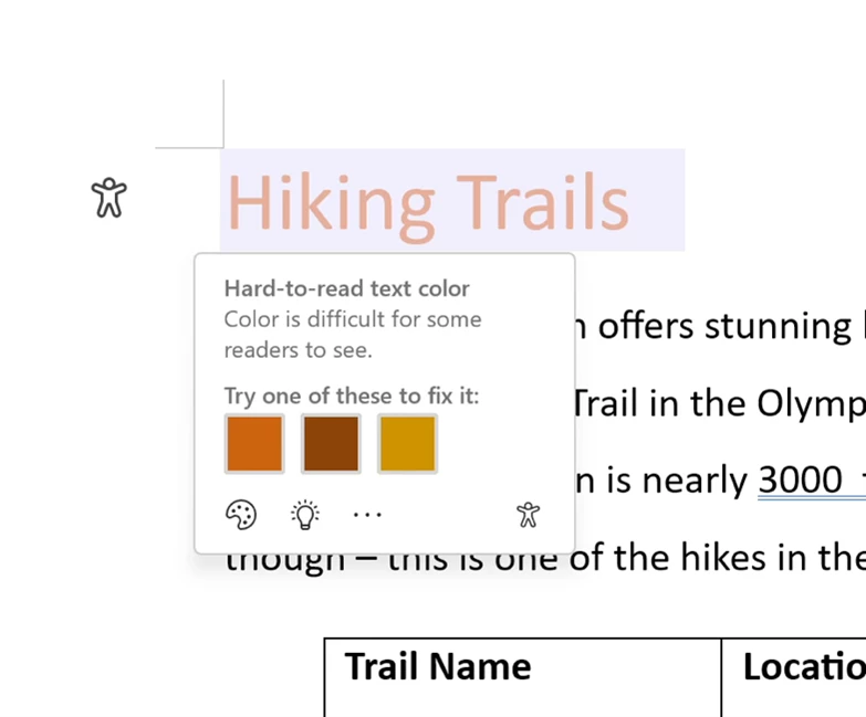 Segment of a Word document with the words &ldquo;Hiking Trails&rdquo; selected. A contextual card is showing below the selected text which reads &ldquo;Hard-to-read text color. Color is difficult for some readers to see.&rdquo; The card offers three shades of brown with better contrast to choose from.