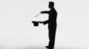 A shadow of a magician. 