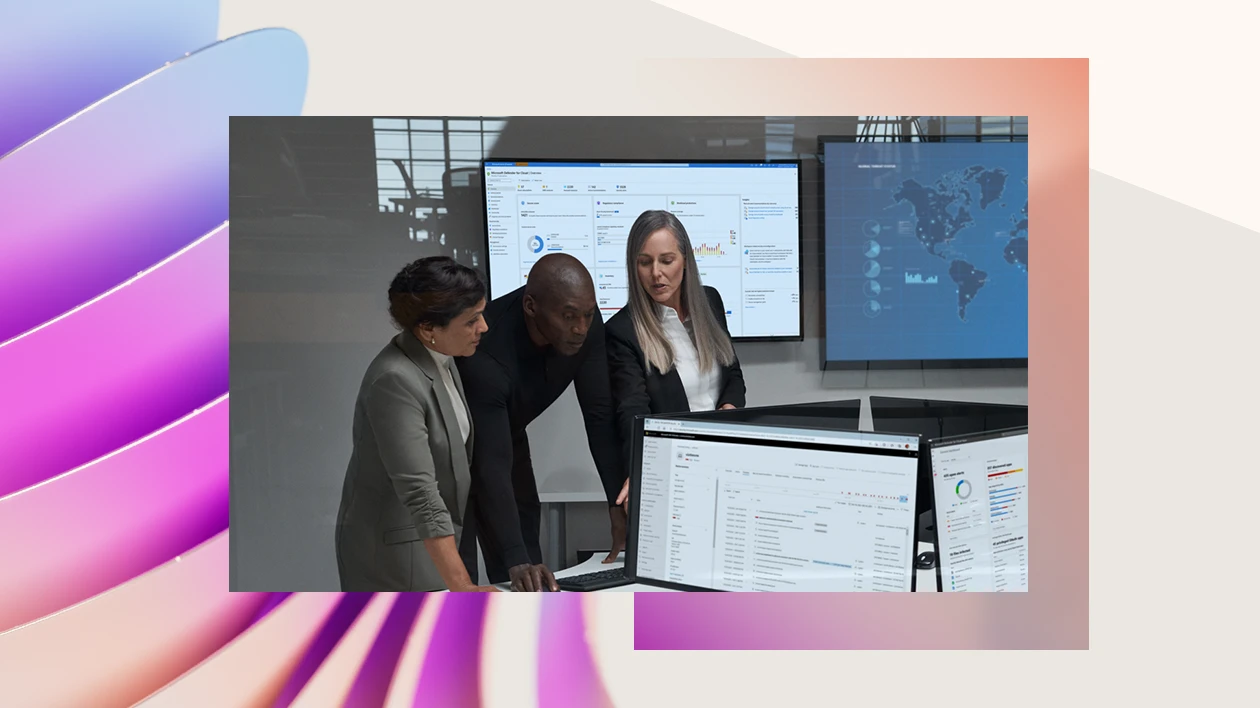 A decorative image of security professionals working on a computer