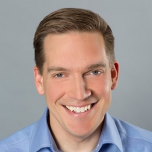 A man smiling at the camera