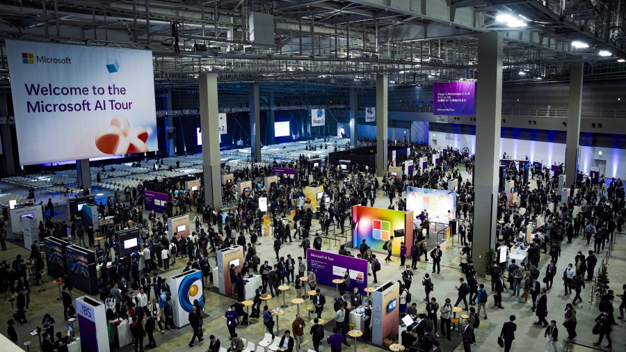 A large room with many people