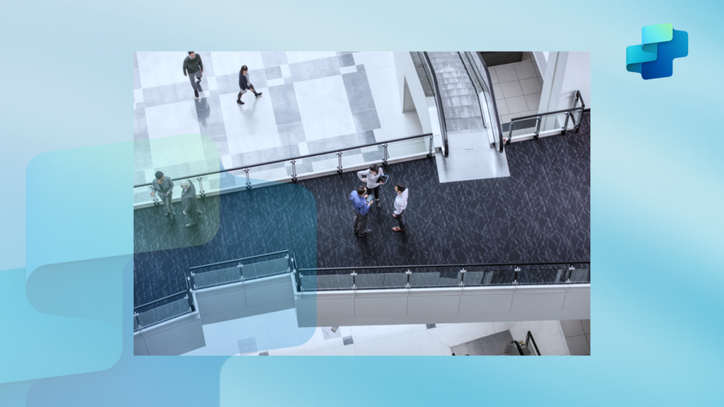 Aerial view of people working on multiple floors in an office