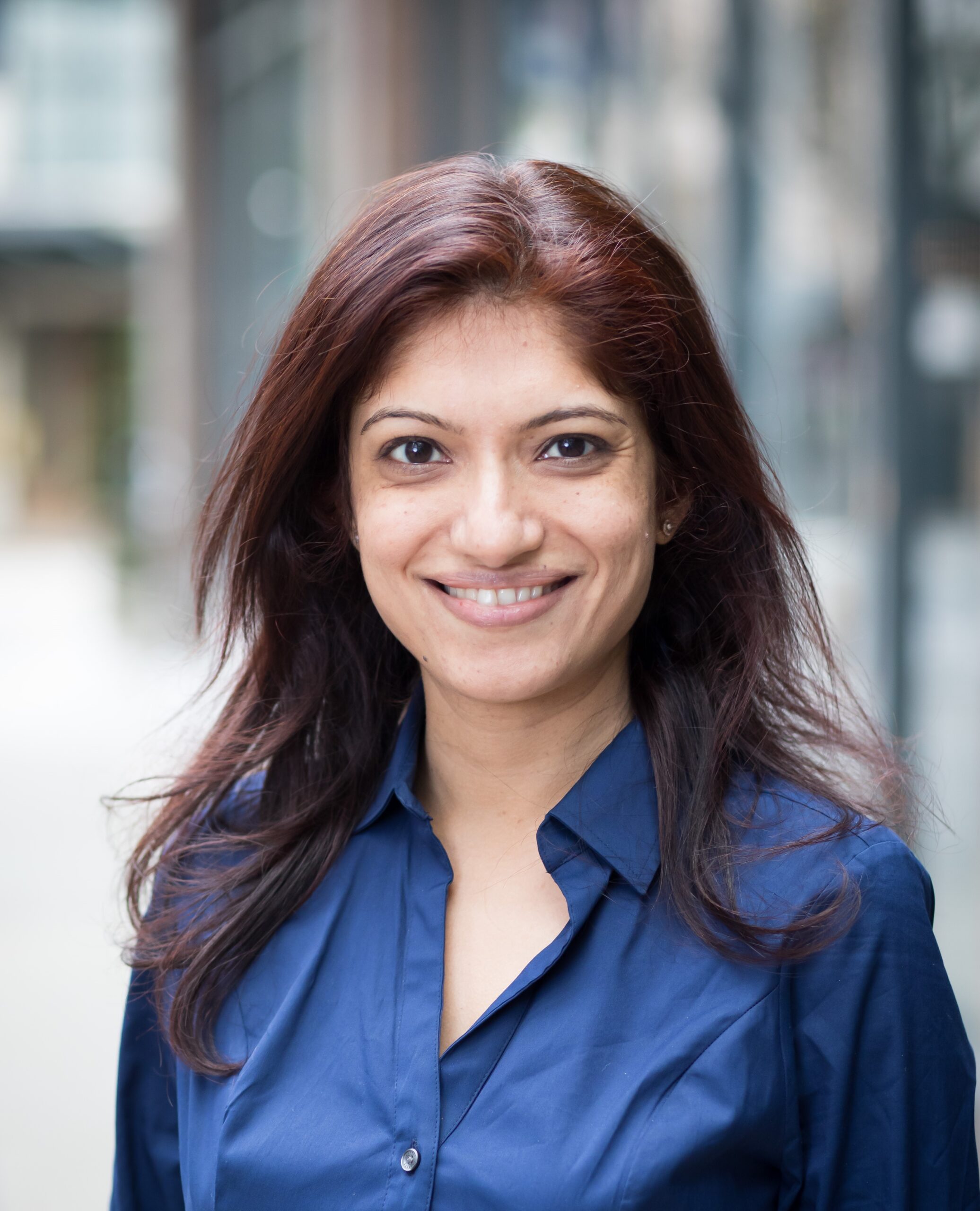 Headshot of Ravs Kaur