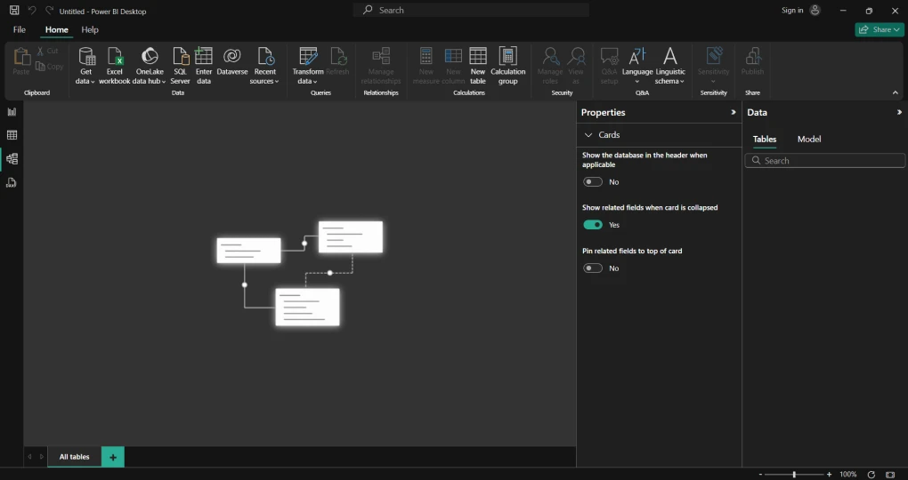 A screenshot that shows the dark mode in Power BI desktop. The Power BI Desktop has a blank canvas with a dark background. 