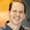 a man smiling for the camera