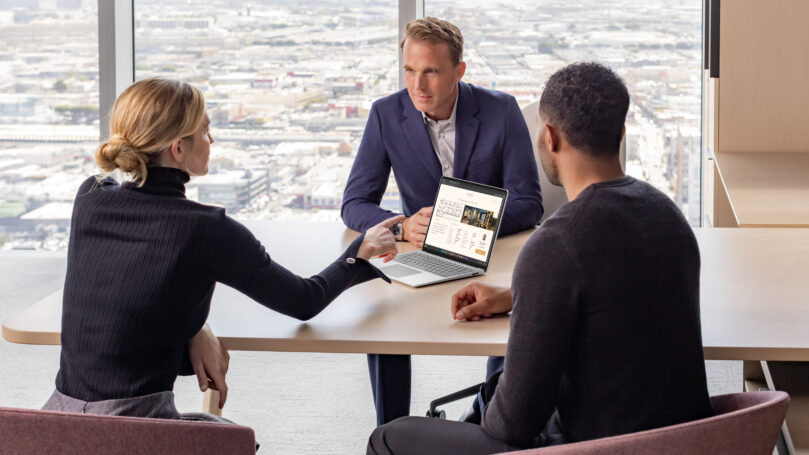 A group of people sitting around a table