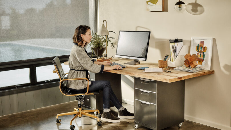 A woman sitting at a desk