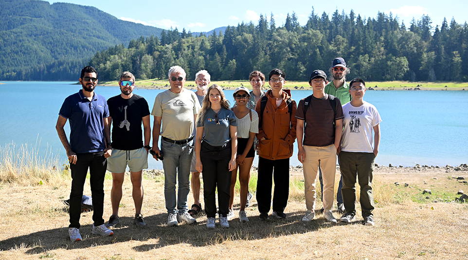 a group of people posing for a photo