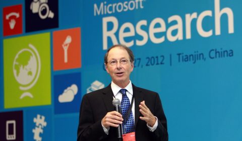 Richard Rashid wearing a suit and tie