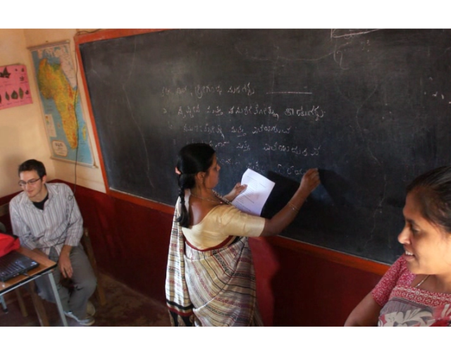 a group of people in a blackboard