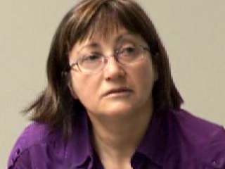 a person wearing a purple shirt