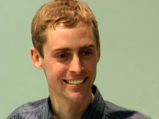 a man smiling for the camera