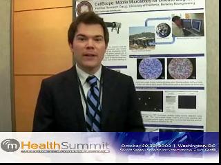 Erik Douglas wearing a suit and tie