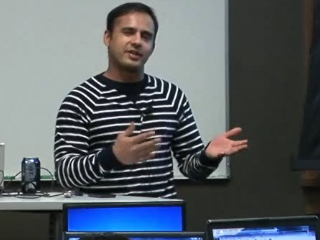 a person standing in front of a computer