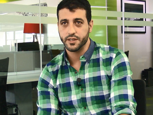 a man in a green shirt