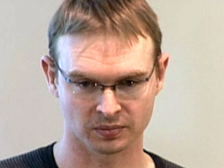 a man smiling for the camera