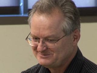 a man wearing glasses