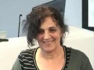 a woman smiling for the camera